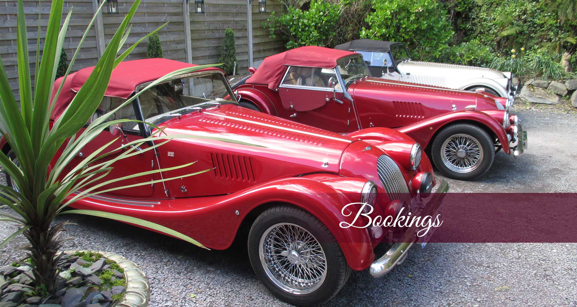 Bookings Banner showing 3 classic Morgan cars - At Plas Tan-Yr-Allt - 5-Star luxury, literary & historic Country House B&B in Tremadog, Porthmadog, Snowdonia.